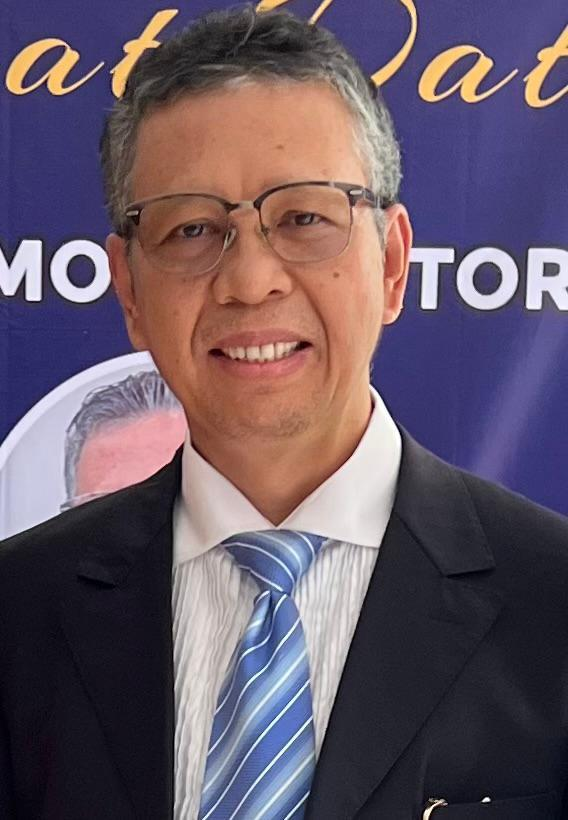 Dr. (Commerce) Timotius Tumbur Simbolon, SH., MH.