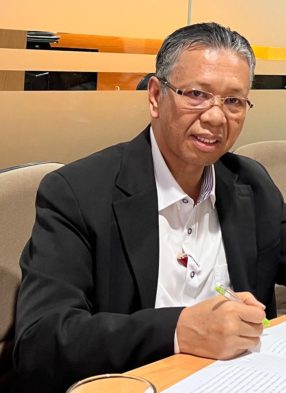 Dr. (Commerce) Timotius Tumbur Simbolon, SH., MH.